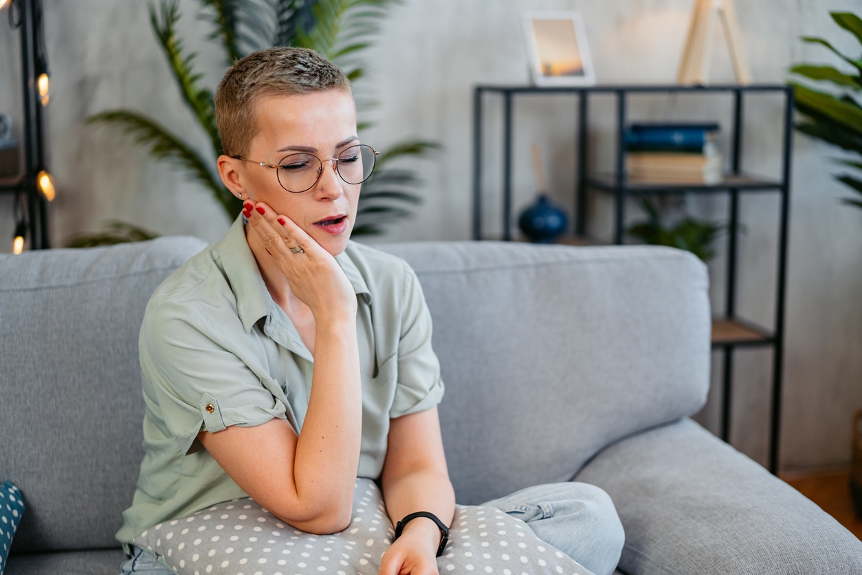 Woman Having Toothache At Home.
